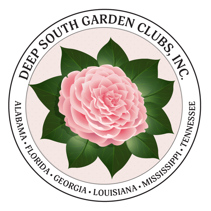 A pink flower with green leaves in the center.