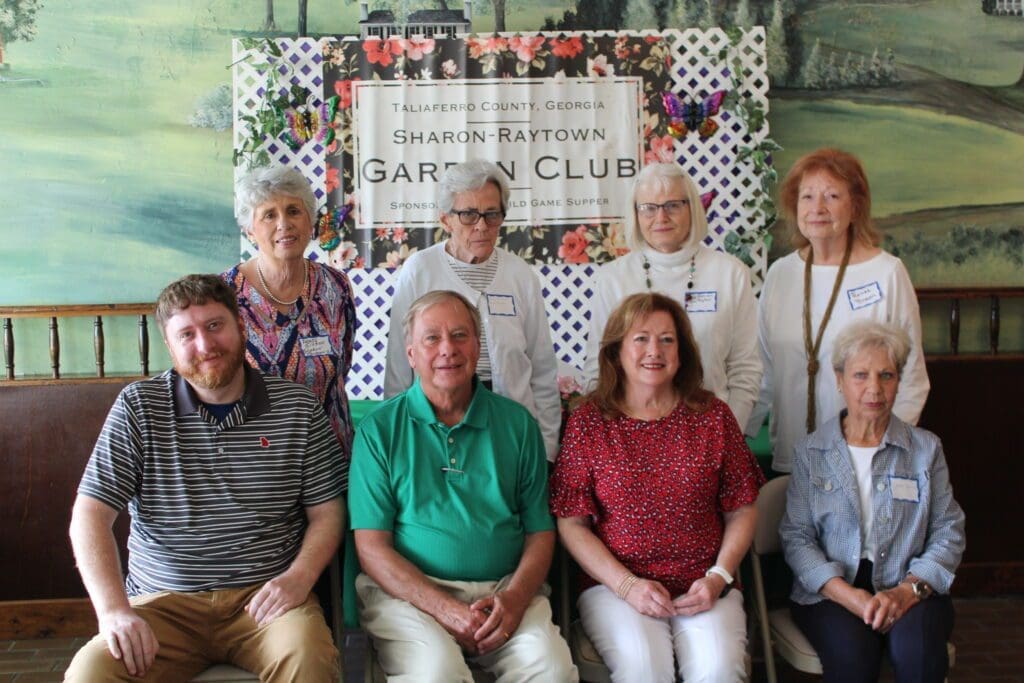 A group of people posing for a picture.
