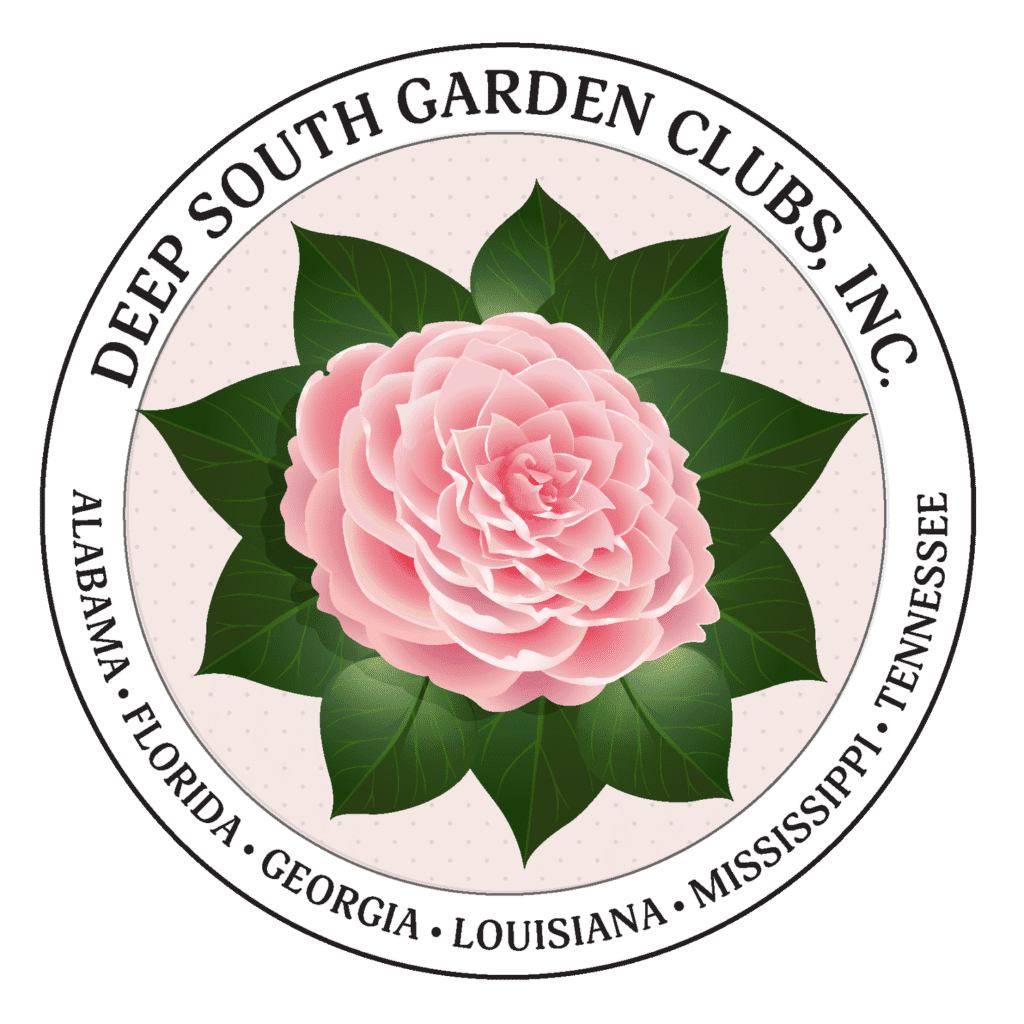 Circular emblem with pink camellia and text