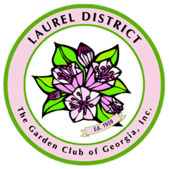 Circular logo with pink flowers and green leaves